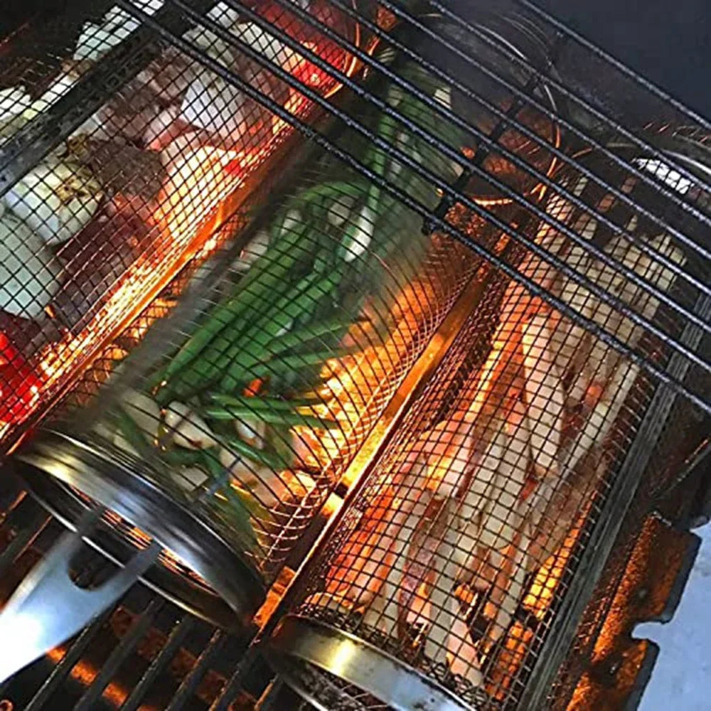 Grill roasting baskets with vegetables and meat over open flame BBQ