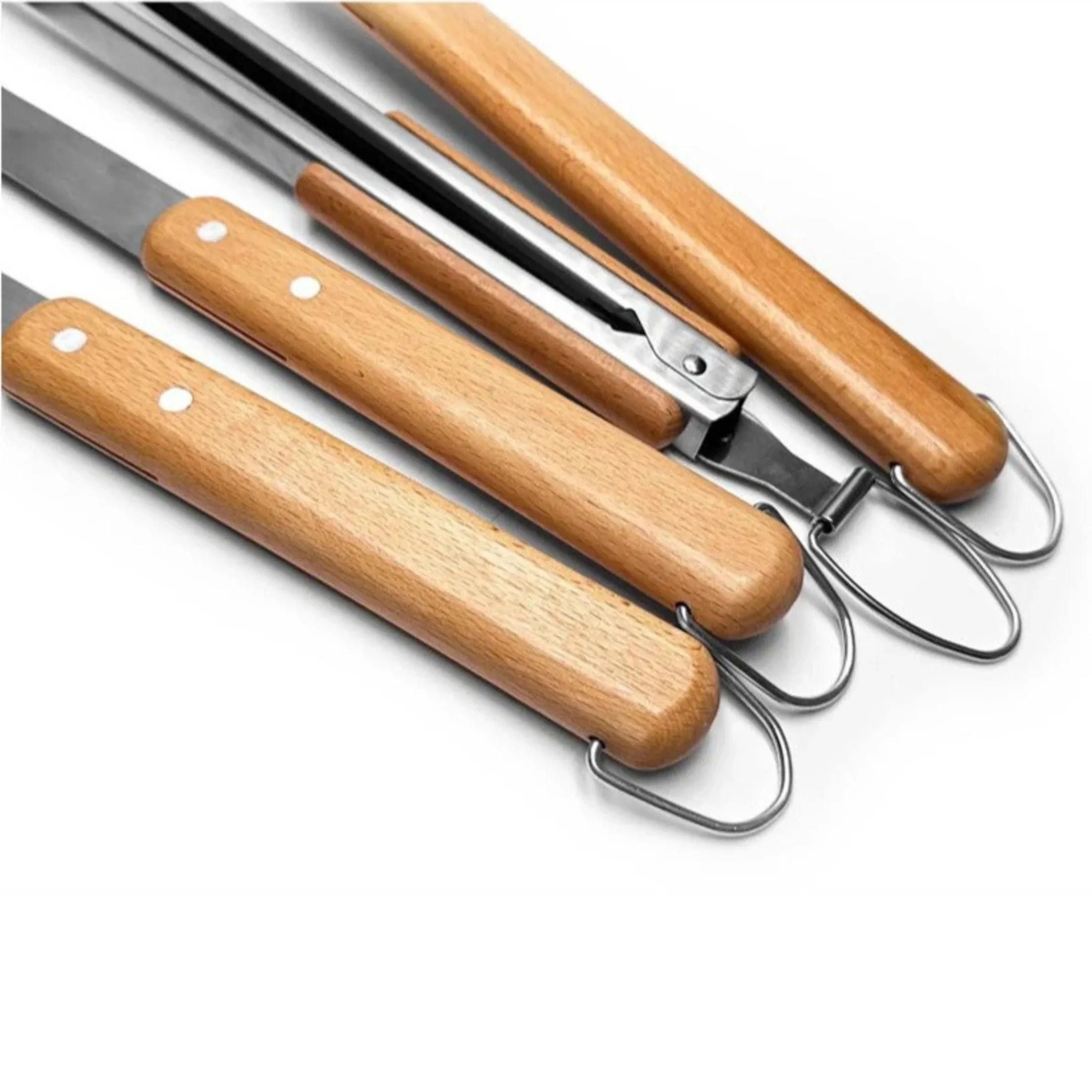 Close-up of wooden handle BBQ tools with metal hangers on a white background